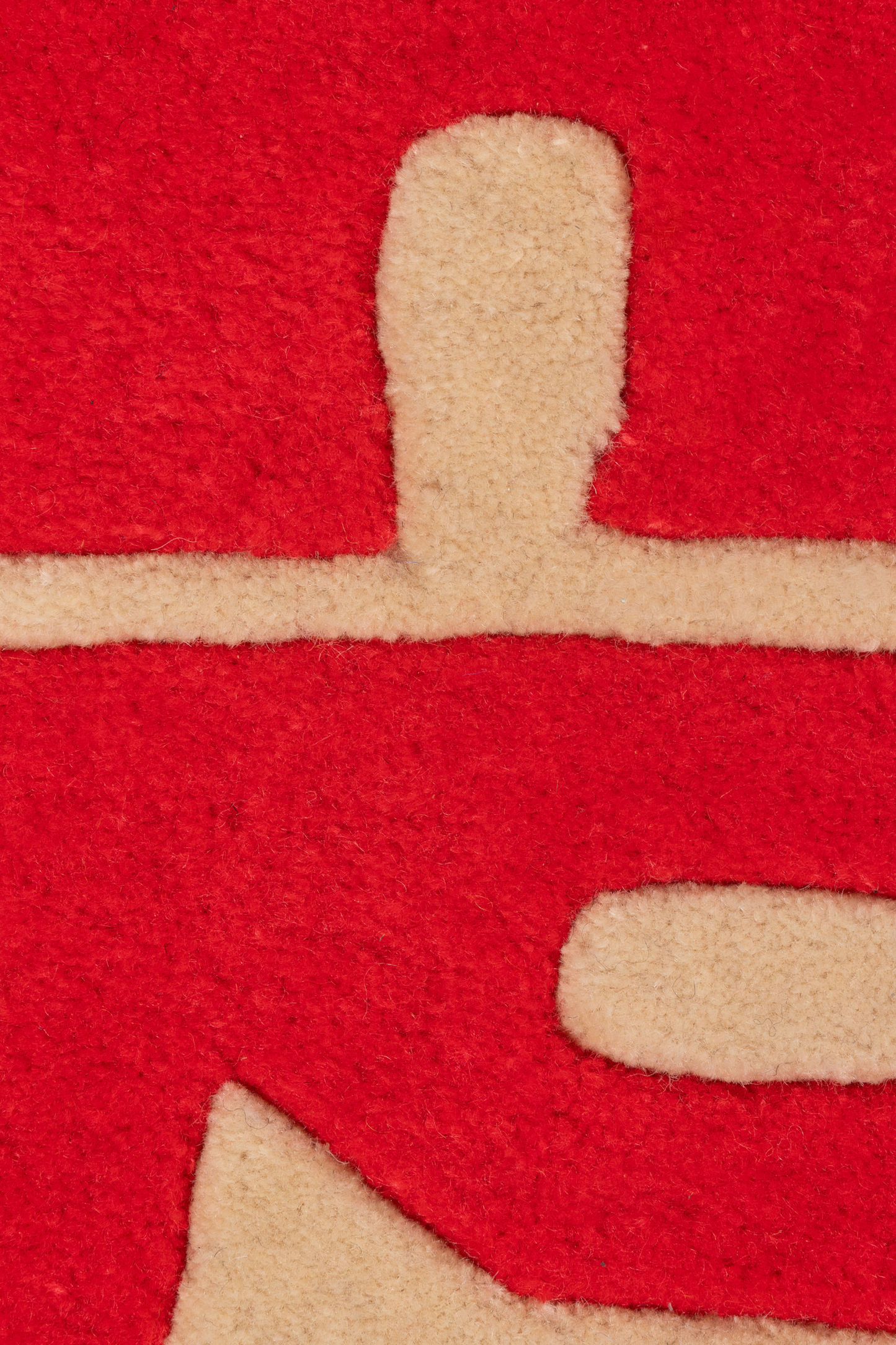Cheeky Half-Moon Tufted Rug – Red & Cream Wavy Text Rug
