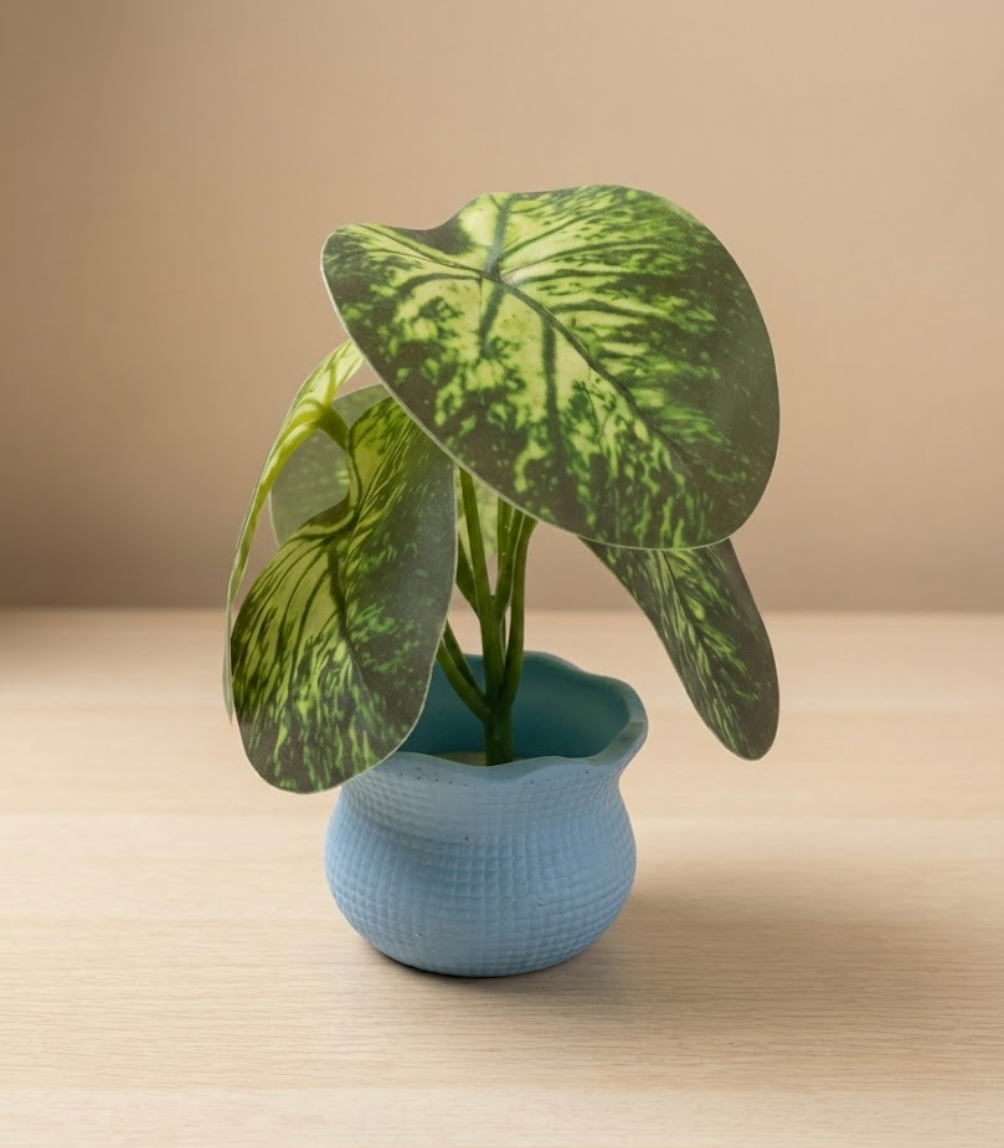 Faux Variegated Caladium in Blue Pot